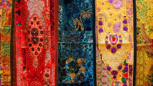 What Are the Common Fabrics and Textiles Used in Uttarakhand Traditional Dresses